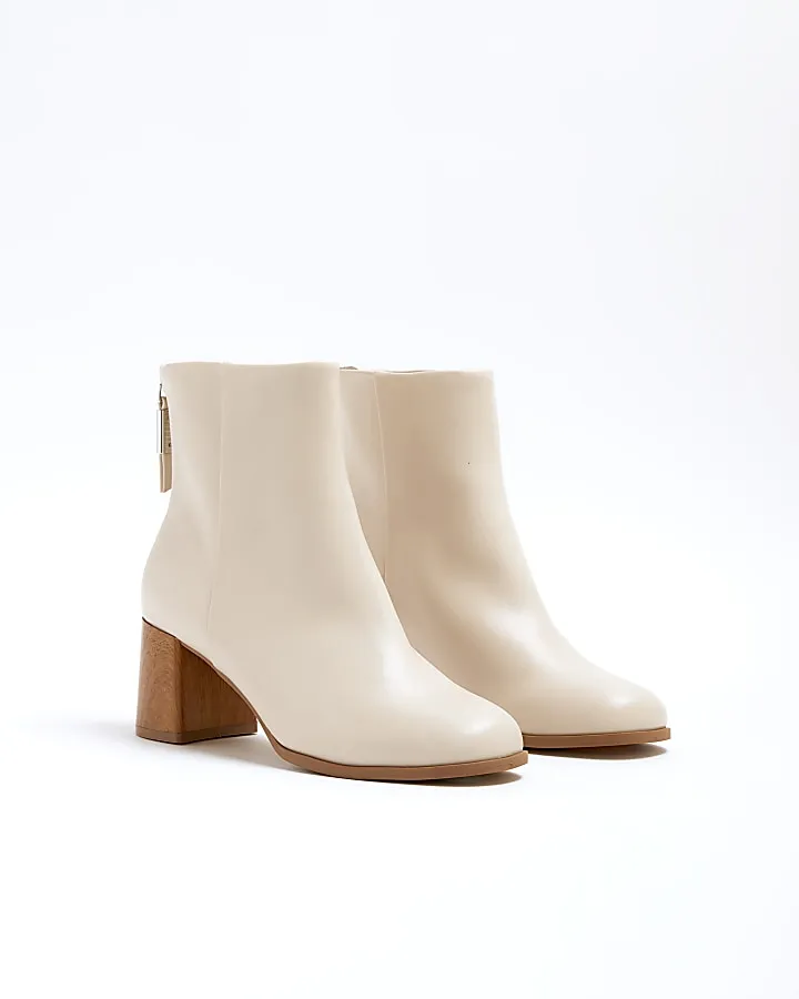 Cream block heeled ankle boots