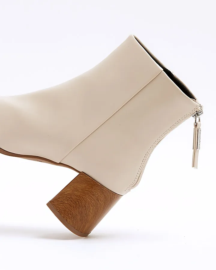 Cream block heeled ankle boots