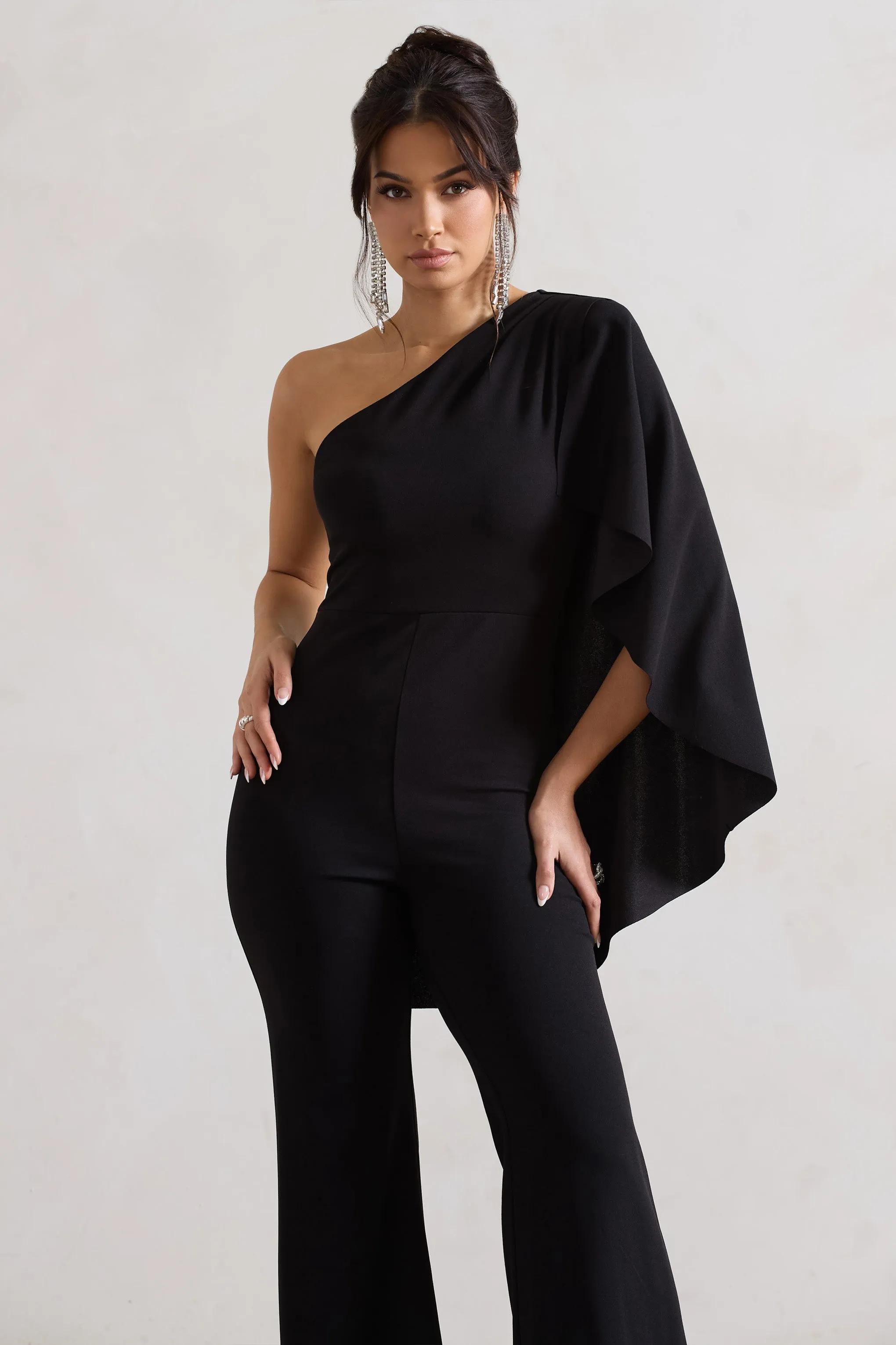 Pristine | Black One Shoulder Cape Sleeve Flared-Leg Jumpsuit